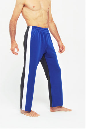 Contemporary Dance Pants es un pantalón de danza técnico unisex para entrenamiento de baile, danza contemporánea, acrobacia, yoga, artes marciales, pilates y cualquier disciplina vinculada al movimiento. Ideal para el trabajo de suelo, con un tejido resistente, deslizante y super absorbente. Color Azul Blanco y negro.