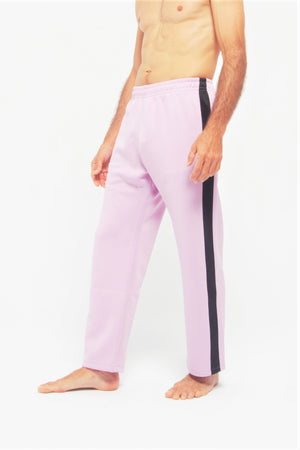 Contemporary Dance Pants es un pantalón de danza técnico unisex para entrenamiento de baile, danza contemporánea, acrobacia, yoga, artes marciales, pilates y cualquier disciplina vinculada al movimiento. Ideal para el trabajo de suelo, con un tejido resistente, deslizante y super absorbente. Color Lila y Negro.