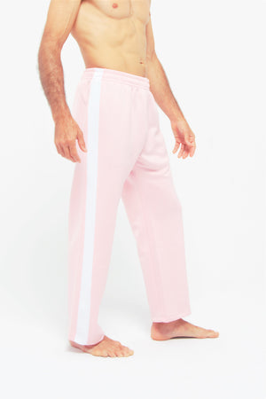 Contemporary Dance Pants es un pantalón de danza técnico unisex para entrenamiento de baile, danza contemporánea, acrobacia, yoga, artes marciales, pilates y cualquier disciplina vinculada al movimiento. Ideal para el trabajo de suelo, con un tejido resistente, deslizante y super absorbente. Color Rosa y Blanco.