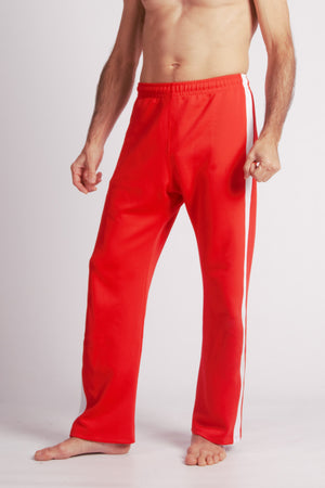 Flying Dance Pants es un pantalón de danza técnico unisex para entrenamiento de baile, danza contemporánea, acrobacia, yoga, artes marciales, pilates y cualquier disciplina vinculada al movimiento. Ideal para el trabajo de suelo, con un tejido resistente, deslizante y super absorbente. Color Rojo y Blanco