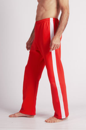 Flying Dance Pants es un pantalón de danza técnico unisex para entrenamiento de baile, danza contemporánea, acrobacia, yoga, artes marciales, pilates y cualquier disciplina vinculada al movimiento. Ideal para el trabajo de suelo, con un tejido resistente, deslizante y super absorbente. Color Rojo y Blanco