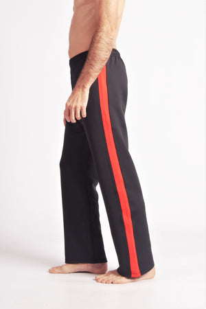 Flying Dance Pants es un pantalón de danza técnico unisex para entrenamiento de baile, danza contemporánea, acrobacia, yoga, artes marciales, pilates y cualquier disciplina vinculada al movimiento. Ideal para el trabajo de suelo, con un tejido resistente, deslizante y super absorbente. Color Negro y Rojo.
